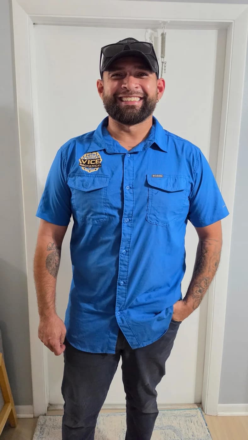 Pedro Javier Pereira Jr., founder and president of Vice Mechanical, in a branded Vice Mechanical shirt